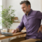 Professional experiencing lower back discomfort during a screen-heavy workday